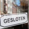 bord 'gesloten' aan raam
